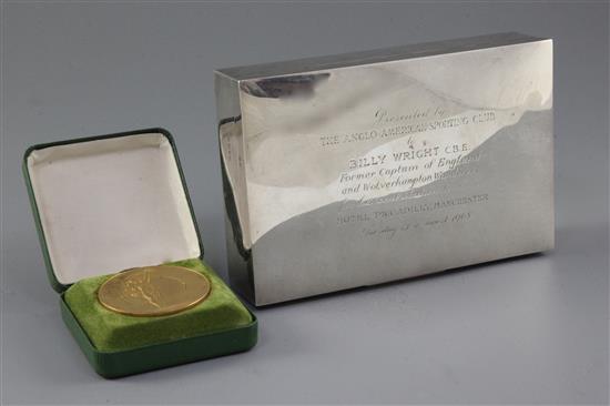 A silver cigarette box presented to Billy Wright & a medallion